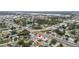 Aerial view of property, highlighting its location near a major road and other homes at 6950 113Th St, Seminole, FL 33772