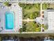 Complex aerial view, showing pool, landscaping, and building at 701 Poinsettia Rd # 302, Belleair, FL 33756