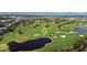 Aerial view of a golf course with water features at 701 Poinsettia Rd # 302, Belleair, FL 33756