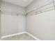 Spacious walk-in closet with wire shelving at 701 Poinsettia Rd # 302, Belleair, FL 33756