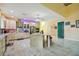 Bright kitchen with white cabinets, marble countertops, and an island at 711 Eagle Ln, Apollo Beach, FL 33572