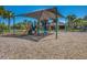 Playground with slide, climbing structures, and swings at 7395 Steer Blade Dr, Zephyrhills, FL 33541