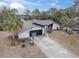 House with driveway and basketball hoop at 8237 Delaware Dr, Weeki Wachee, FL 34607