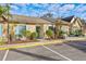 Front view of townhome with teal shutters and stone accents at 8615 Carroll Oaks Dr, Tampa, FL 33614