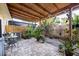 Relaxing patio with covered seating and lush plants at 8615 Carroll Oaks Dr, Tampa, FL 33614