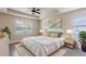 Spacious main bedroom with king-size bed and neutral decor at 9057 Bantry Bay Blvd, Englewood, FL 34224