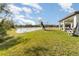 Spacious backyard with pond view at 9215 Royal River Cir, Parrish, FL 34219