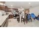 Bright kitchen boasts ample counter space and dark wood cabinetry at 9215 Royal River Cir, Parrish, FL 34219