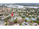 Condo community overview, showcasing waterfront and tennis courts at 1018 Caravel Ct, Tarpon Springs, FL 34689