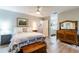 Main bedroom with ample space and a view into the bathroom at 1018 Caravel Ct, Tarpon Springs, FL 34689