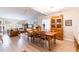 Open dining area with wooden table, chairs, and built-in hutch at 1018 Caravel Ct, Tarpon Springs, FL 34689