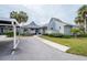 Charming house with carport and landscaping at 1018 Caravel Ct, Tarpon Springs, FL 34689