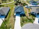 Aerial view of a house in a residential neighborhood at 105 Oakwood Ct, Rotonda West, FL 33947