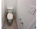 Small bathroom with toilet and wall mounted towel bar at 105 Oakwood Ct, Rotonda West, FL 33947