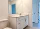 Bathroom with vanity, sink, and mirror at 105 Oakwood Ct, Rotonda West, FL 33947