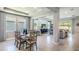 Bright dining area with farmhouse table and chairs at 10535 Bridgegate Heights Loop, San Antonio, FL 33576