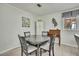 Charming dining area with round table and four chairs at 10581 Pine Island Dr, Weeki Wachee, FL 34607