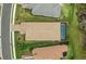 Aerial view of house with pool in backyard at 10804 Wicker Park Pl, Palmetto, FL 34221