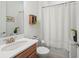 Clean bathroom with shower/tub combo and updated vanity at 10804 Wicker Park Pl, Palmetto, FL 34221