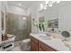 Clean and modern bathroom with shower and updated vanity at 10804 Wicker Park Pl, Palmetto, FL 34221