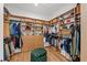 Large walk-in closet with ample shelving and hanging space at 10804 Wicker Park Pl, Palmetto, FL 34221