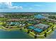 Aerial view of community amenities and homes at 10804 Wicker Park Pl, Palmetto, FL 34221