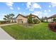 Single-Gathering home with landscaping and driveway at 10804 Wicker Park Pl, Palmetto, FL 34221