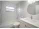 Modern bathroom with white subway tiles and vanity at 1203 Baronwood Pl, Brandon, FL 33510