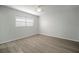 Bedroom with wood-look floors and ceiling fan at 1203 Baronwood Pl, Brandon, FL 33510