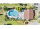 Aerial view of community pool and clubhouse at 1311 Powderpuff Dr # 4, Dunedin, FL 34698