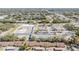 Wide aerial view of the community and surrounding area at 1311 Powderpuff Dr # 4, Dunedin, FL 34698