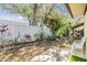 Private backyard oasis with lush landscaping and patio at 1311 Powderpuff Dr # 4, Dunedin, FL 34698