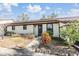 Front entrance and landscaping of a condo unit at 1311 Powderpuff Dr # 4, Dunedin, FL 34698