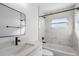 Clean bathroom with marble tile and bathtub at 13145 Flotilla Ct, Brooksville, FL 34613