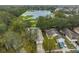 Aerial view showing house location near a lake and other homes at 1415 Mohrlake Dr, Brandon, FL 33511