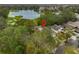 Aerial view of property near lake and residential area at 1415 Mohrlake Dr, Brandon, FL 33511