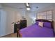 Bedroom with large closet and purple bedding at 1415 Mohrlake Dr, Brandon, FL 33511