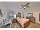 Spacious bedroom with ample closet space and wood flooring at 1415 Mohrlake Dr, Brandon, FL 33511