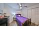 Bedroom with double closet and purple bedding at 1415 Mohrlake Dr, Brandon, FL 33511