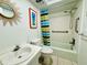 Bathroom with tub, shower, and vanity at 1701 Pinehurst Rd # 8B, Dunedin, FL 34698