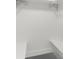 White closet with built-in shelves and rod at 1807 W Crawford St, Tampa, FL 33604