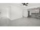 Bright and airy living room with tile floors and a ceiling fan at 1807 W Crawford St, Tampa, FL 33604