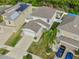 Two-story house with a two-car garage and landscaped yard at 1966 Hawks View Dr, Ruskin, FL 33570