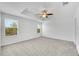 Spacious bedroom with carpeted floor and ceiling fan at 1966 Hawks View Dr, Ruskin, FL 33570