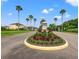 Hawks Point community entrance with landscaping and signage at 1966 Hawks View Dr, Ruskin, FL 33570