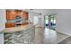 Kitchen boasts granite countertops, stainless steel appliances, and breakfast bar at 1966 Hawks View Dr, Ruskin, FL 33570