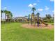 playground with play equipment at 1966 Hawks View Dr, Ruskin, FL 33570