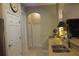 Neutral kitchen space with a granite countertop, an undermounted sink, and tiled floors at 2124 Sifield Greens Way # 11, Sun City Center, FL 33573