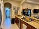 Kitchen with granite countertops and a view of the bathroom at 2124 Sifield Greens Way # 11, Sun City Center, FL 33573