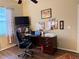 Home office with hardwood floors and a desk at 2124 Sifield Greens Way # 11, Sun City Center, FL 33573